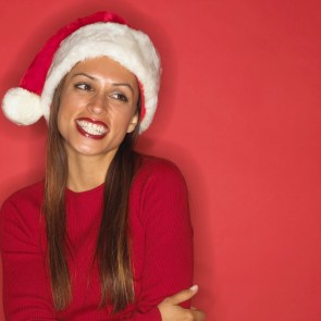Festive Woman in Red Santa Hat